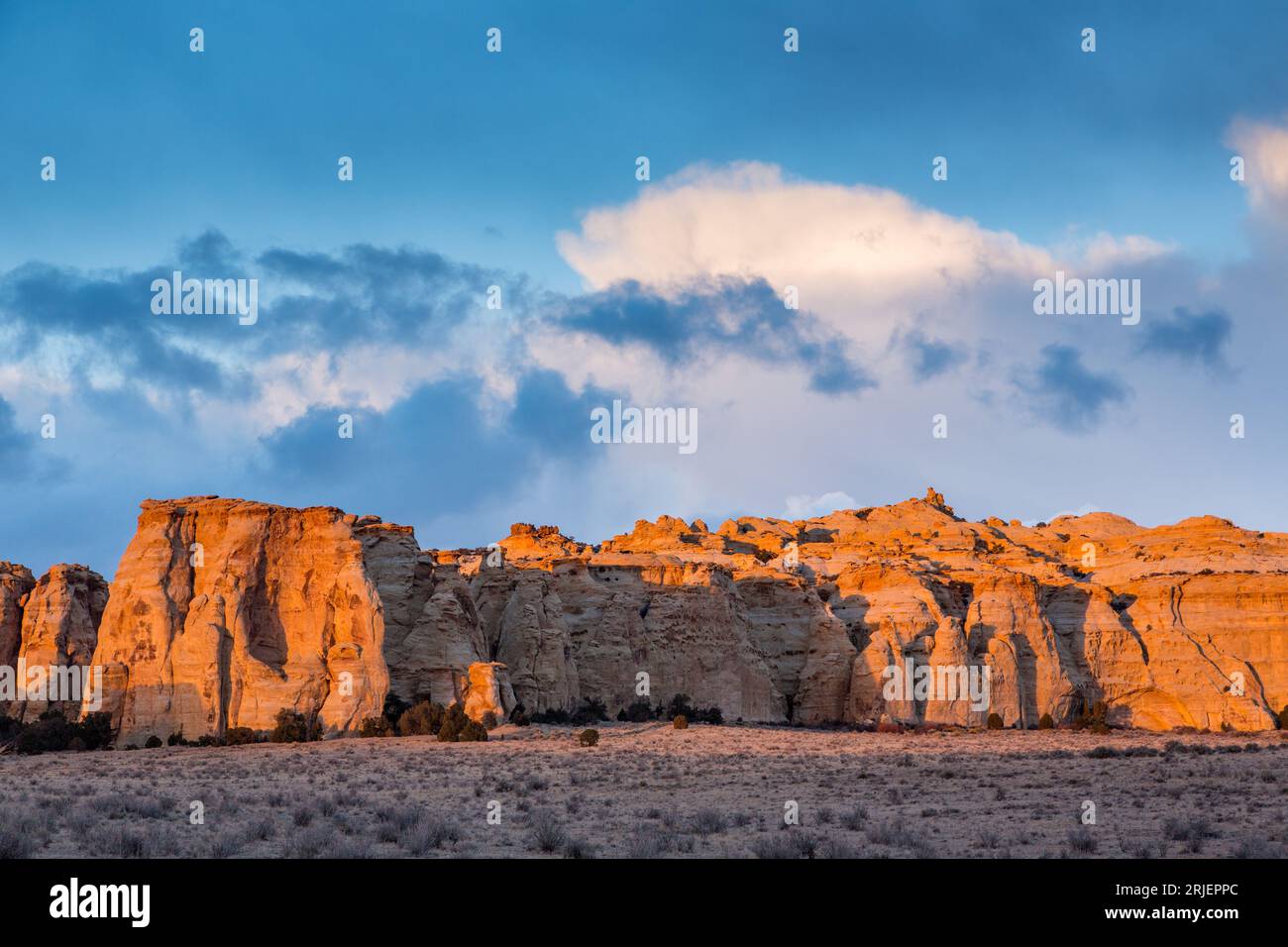Colorful sculpted Navajo Sandstone formations at sunset in the Head of Sinbad area of the San Rafael Swell in Utah. Stock Photo