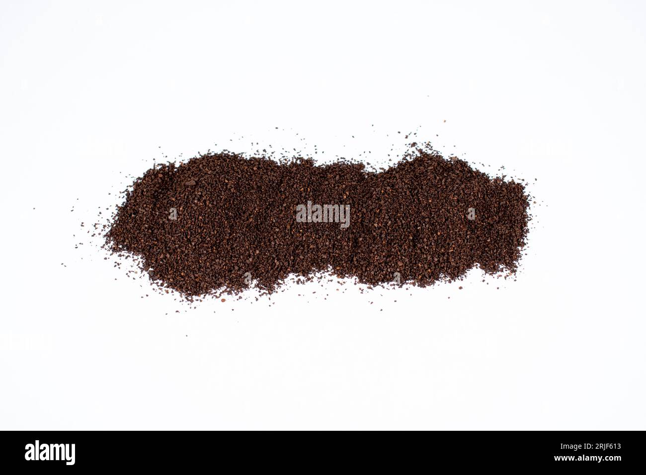 heap of dark roast coffee grounds Stock Photo - Alamy