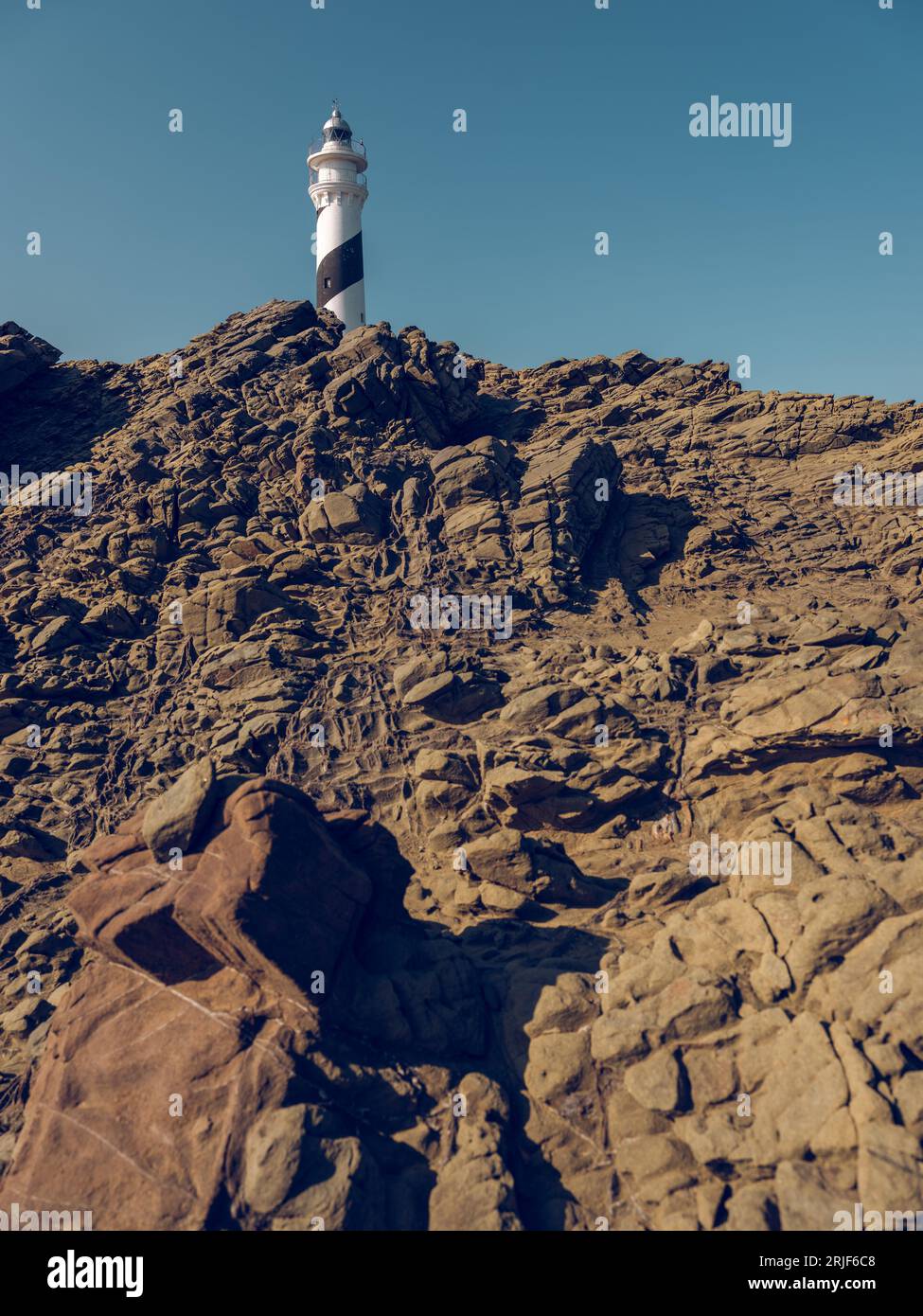 From below of picturesque landscape of white lighthouse tower located ...