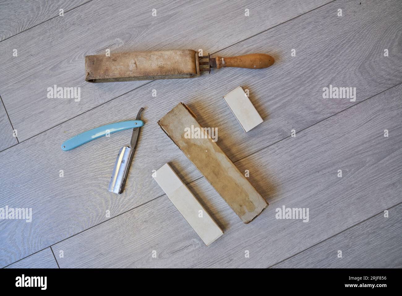 Top view of dangerous old fashioned shaving razor and adjustable razor