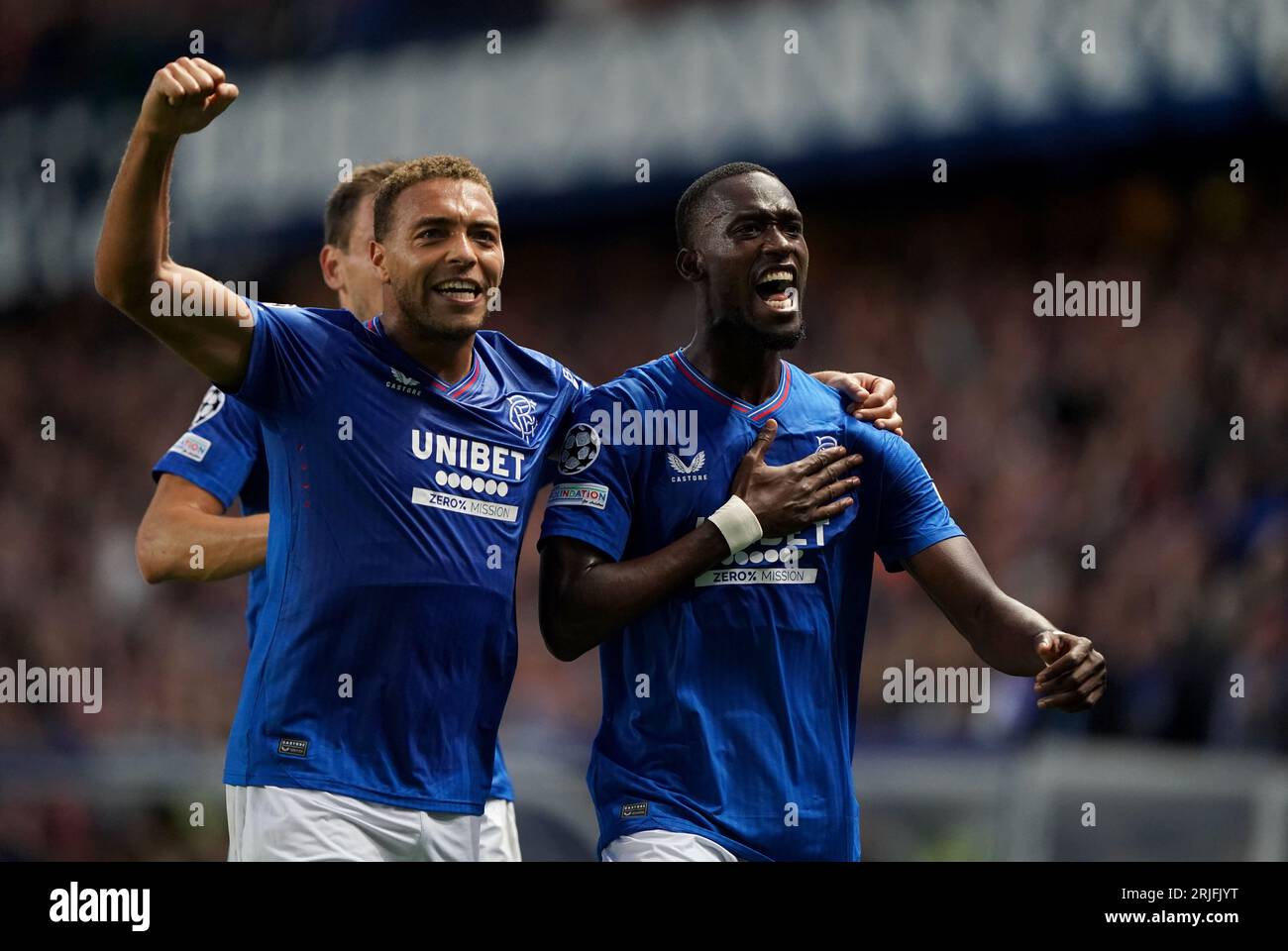 Rangers’ Abdallah Sima (right) celebrates scoring the opening goal with ...
