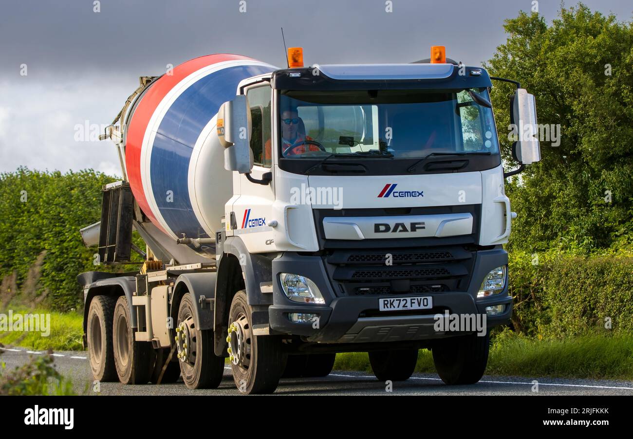 Woburn,Beds.UK - August 19th 2023: 2022 DAF Trucks CF Cemex concrete mixer lorry travelling on an English country road. Stock Photo