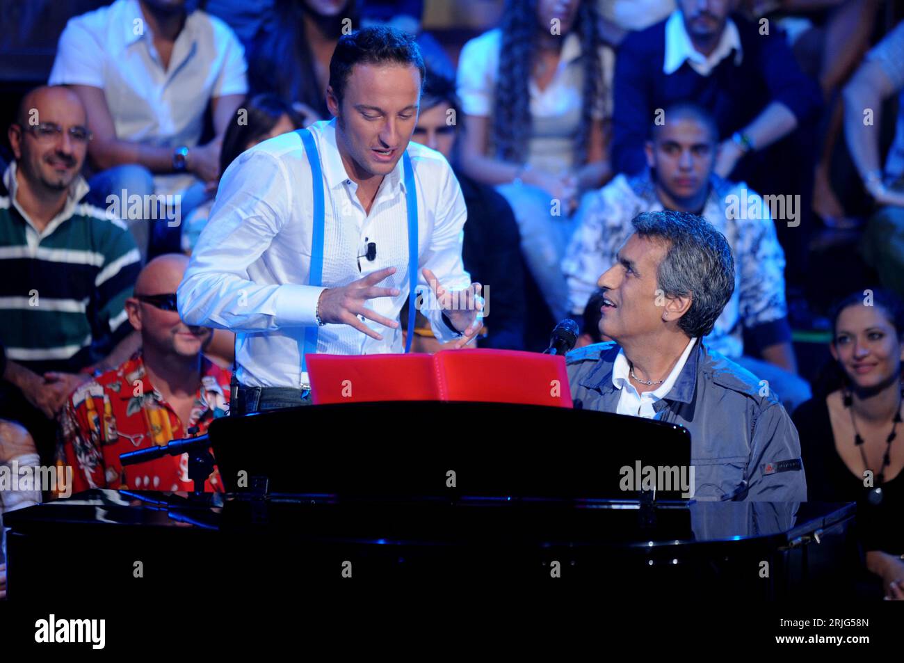 Milan Italy 2008-09-20 : Totò Cutugno and the conductor Francesco Facchinetti during the Rai broadcast 'Scalo 76' Stock Photo