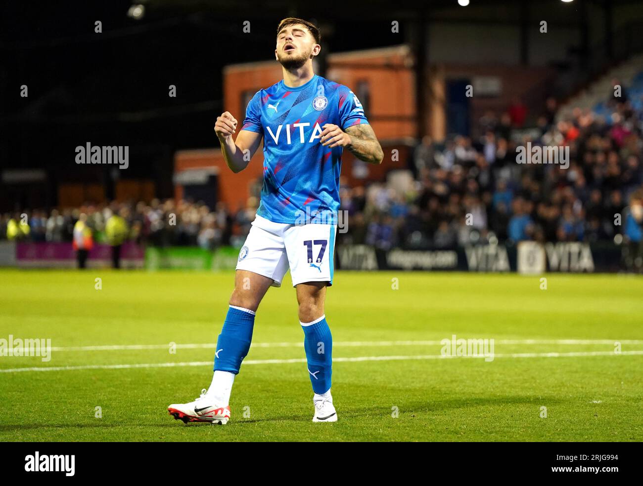 Stockport County's Ryan Rydel reacts after missing a shot in a penalty shoot-out during the EFL Trophy group stage match at Edgeley Park, Stockport. Picture date: Tuesday August 22, 2023. Stock Photo
