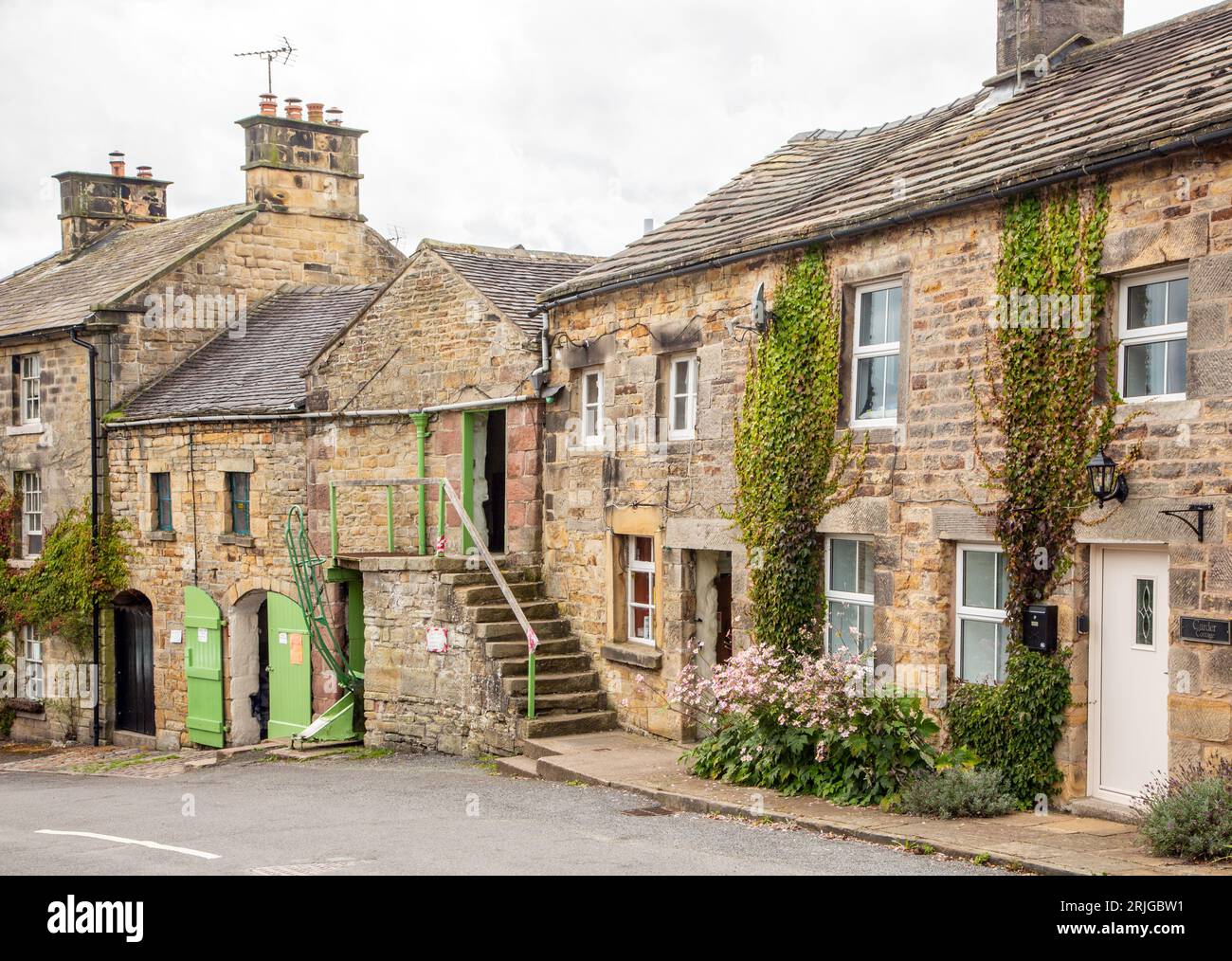 Traditional stone built country cottages in the North Staffordshire Peak District village of Longnor Stock Photo