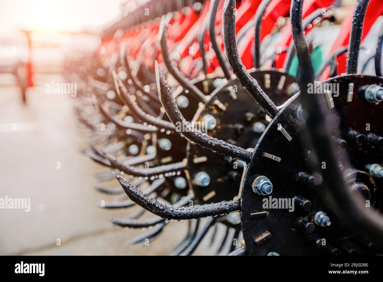 Working parts of modern rotary tooth harrow, close up Stock Photo Alamy