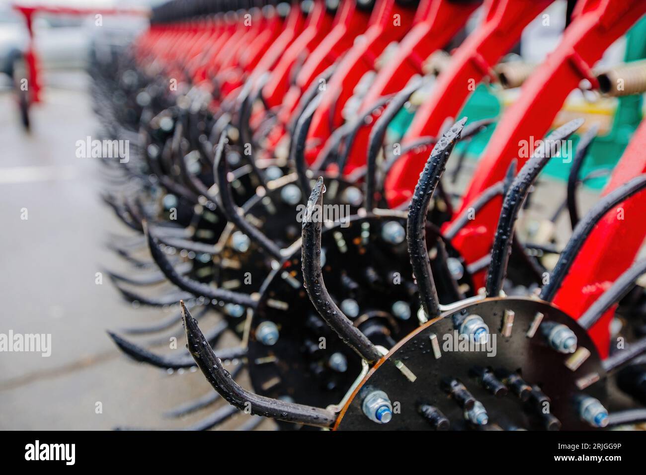 Working parts of modern rotary tooth harrow, close up Stock Photo Alamy