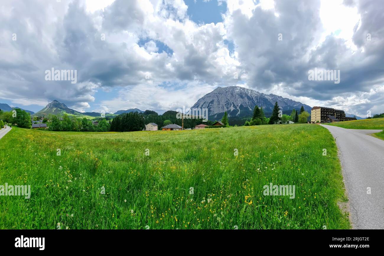Austrian landscape with Grimming mountain (2.351 m),an isolated peak in the Dachstein Mountains,view from small alpine village Tauplitz,Styria,Austria Stock Photo