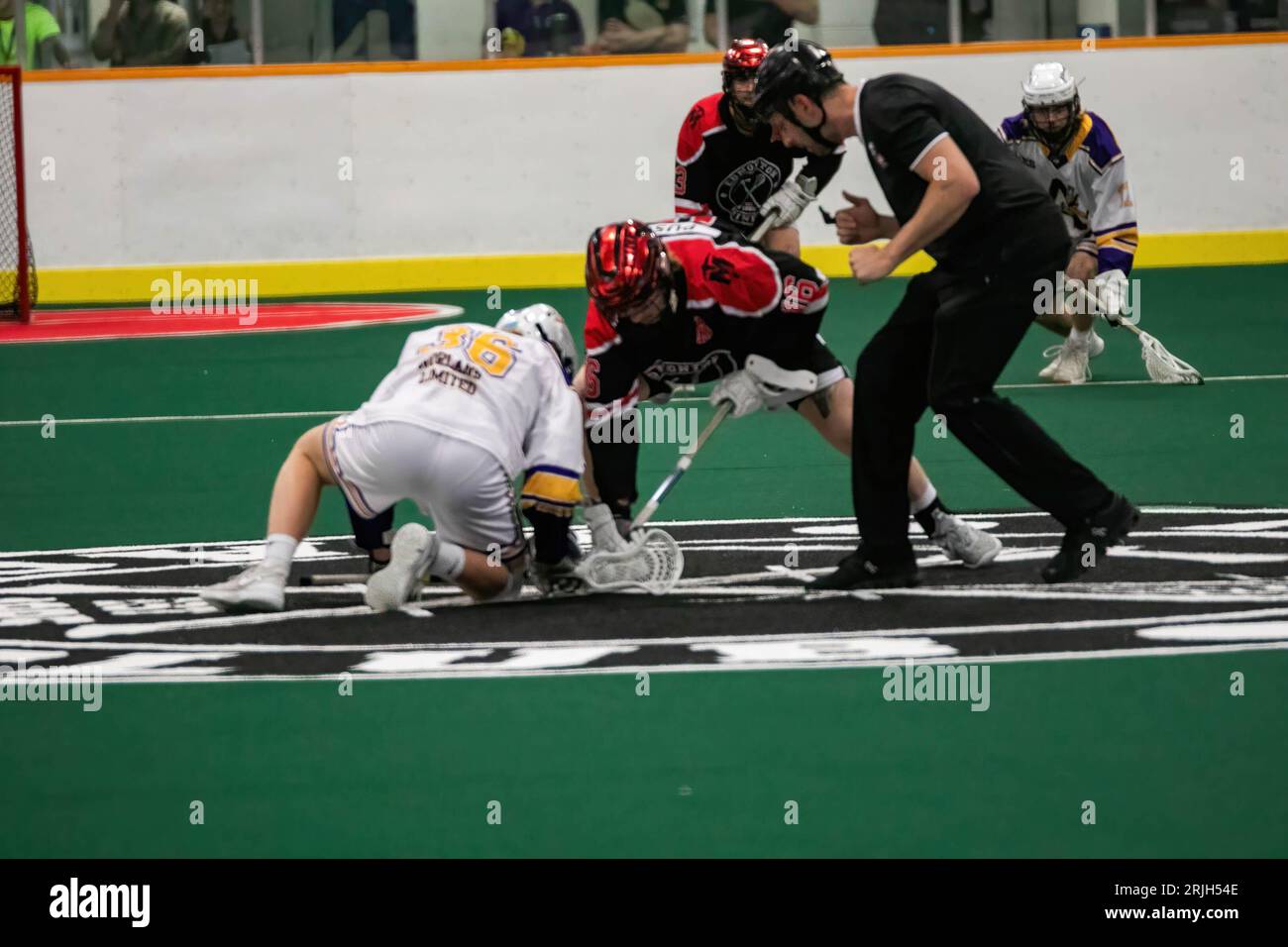 Edmonton Miners (black/orange) Ronin Pusch (16) works the ball in the faceoff circle against Coquitlam Adanacs (White Yellow) Ben Coghill (36) in Minto Cup Day 2 action between Edmonton Miners and Coquitlam Adanacs at Bill Hinter Arena. Final Score: Edmonton Miners vs Coquitlam Adanacs, 11:15 The Minto Cup is the National Junior A Box Lacrosse championship. The Minto Cup was donated in 1901 by Sir Gilbert John Murray Kynmond Elliot, and was formally made the trophy for the Junior A National box lacrosse championship in 1937. (Photo by Ron Palmer/SOPA Images/Sipa USA) Stock Photo