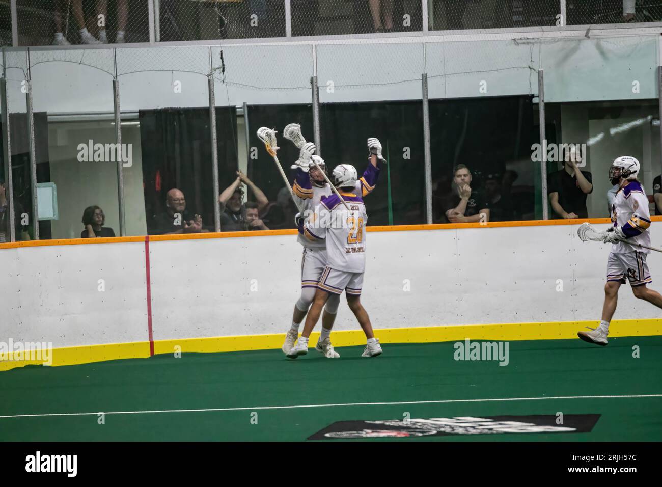 Edmonton, Canada. 20th Aug, 2023. Coquitlam Adanacs (White Yellow) Remo Schenato (17) celebrates with Jordan Reed (28) after scoring in Minto Cup Day 2 action between Edmonton Miners and Coquitlam Adanacs at Bill Hinter Arena. Final Score: Edmonton Miners vs Coquitlam Adanacs, 11:15 The Minto Cup is the National Junior A Box Lacrosse championship. The Minto Cup was donated in 1901 by Sir Gilbert John Murray Kynmond Elliot, and was formally made the trophy for the Junior A National box lacrosse championship in 1937. (Photo by Ron Palmer/SOPA Images/Sipa USA) Credit: Sipa USA/Alamy Live News Stock Photo
