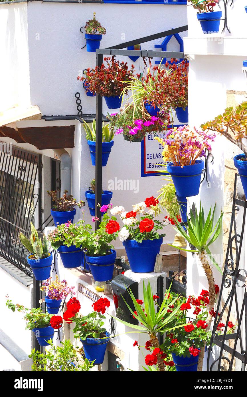 The picturesque House with the Blue Pots, found up several flights of steep steps in Alicante, Spain. The locale is popular with tourists. Stock Photo