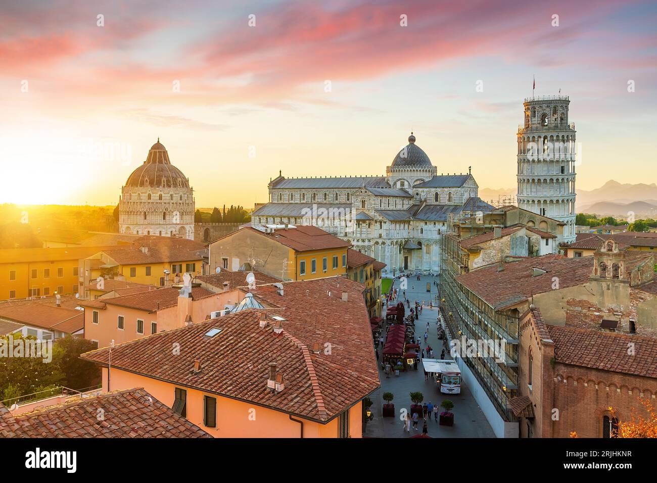 The Famous Leaning Tower In Pisa, Italy With Beautiful Sunset Stock 