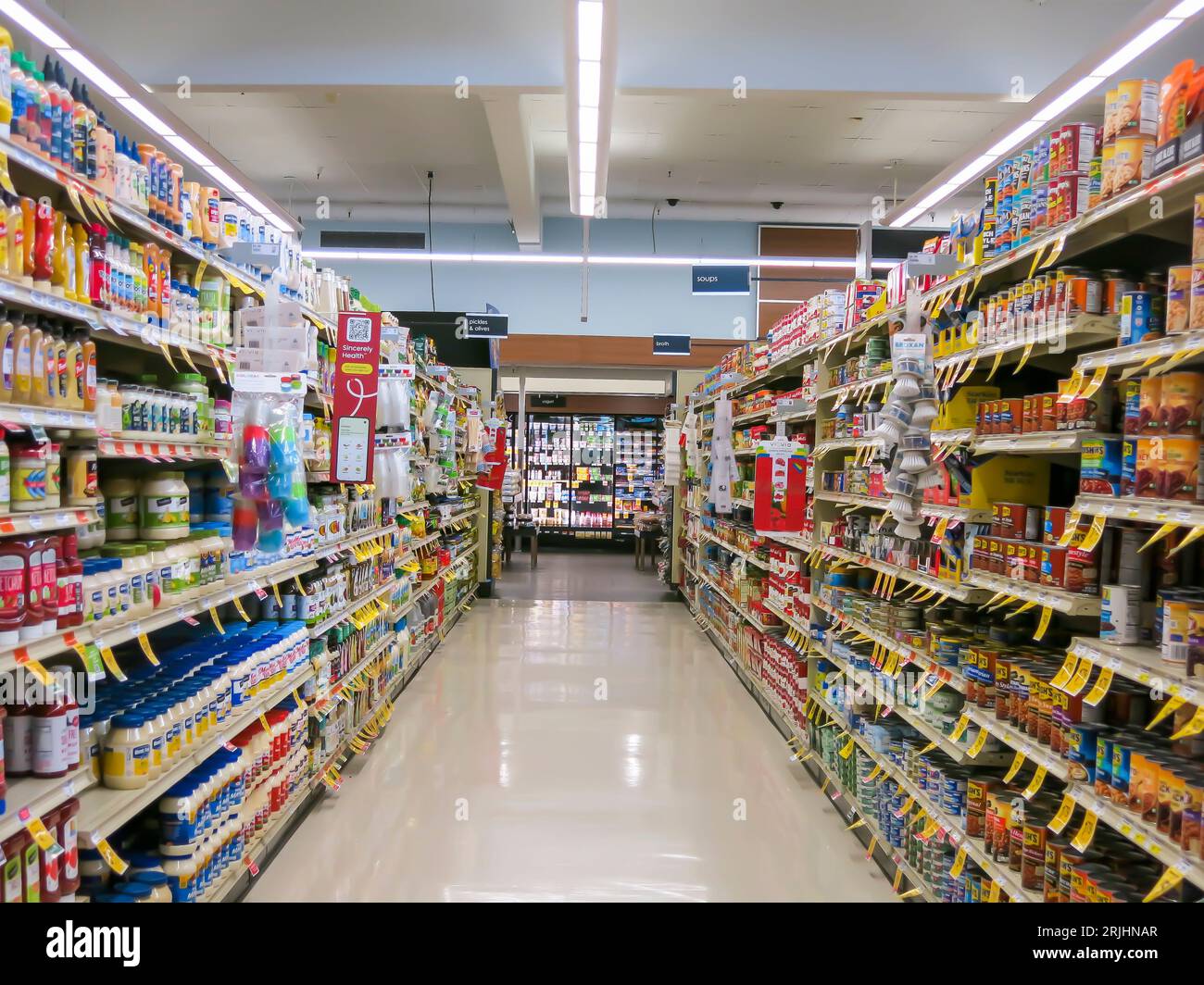 AmView of Merchandize Aisle in Supermarket Stock Photo