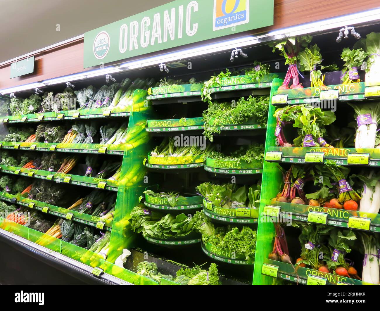 Fresh organic vegetable selection in produce aisle at grocery store  supermarket. Stock Photo