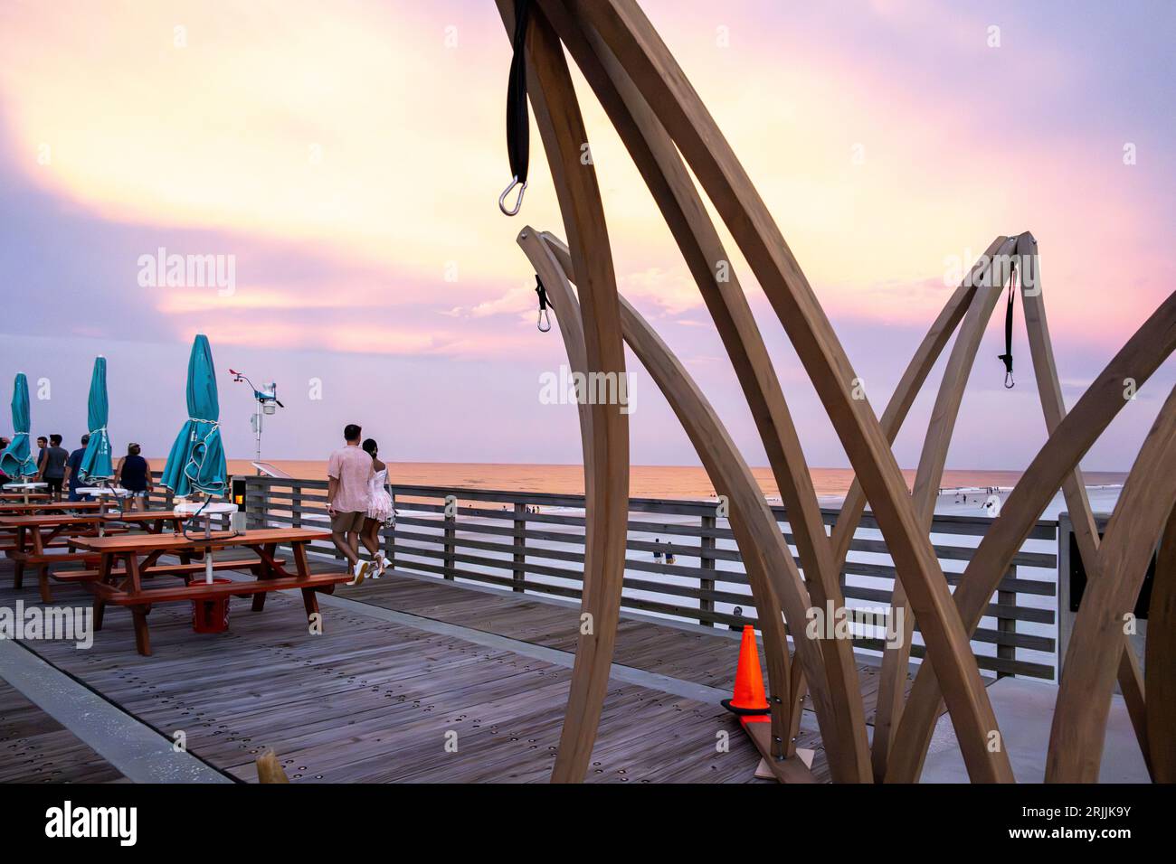 A beautiful evening at dusk on the Jacksonville Beach Pier in Jacksonville Beach, Florida. (USA) Stock Photo