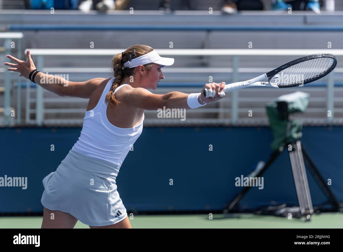 Mary Stoiana of USA returns ball during 1st round match against Victorija Golubic of Switzerland of qualifying for US Open Championship at Billy Jean King Tennis Center in New York on August 22, 2023 Stock Photo