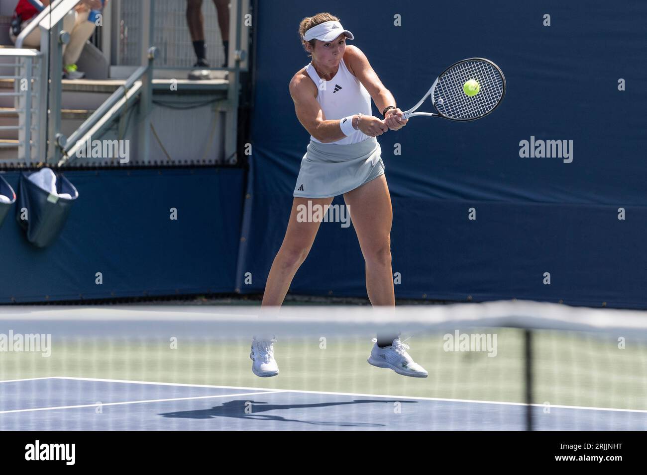 Mary Stoiana of USA returns ball during 1st round match against Victorija Golubic of Switzerland of qualifying for US Open Championship at Billy Jean King Tennis Center in New York on August 22, 2023 Stock Photo