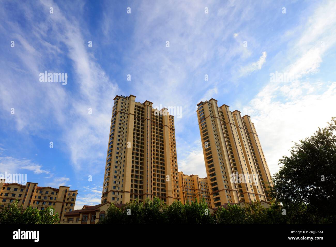 High rise buildings under the blue sky Stock Photo - Alamy