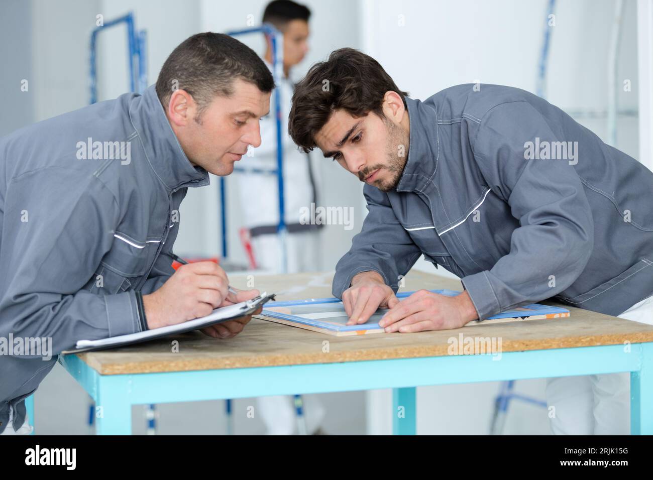 warehouse managers discussing in warehouse office Stock Photo