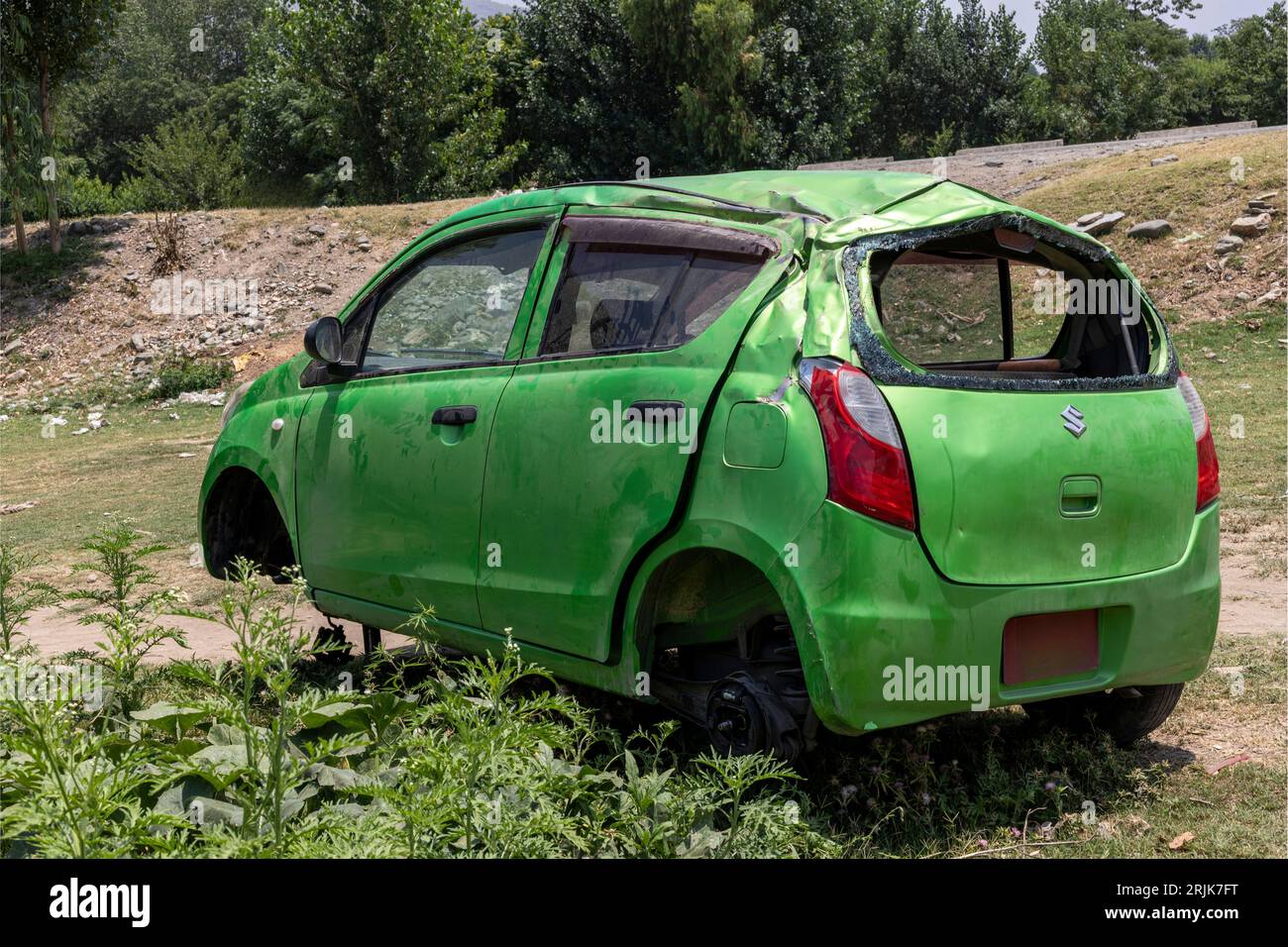 Wrack of an accident car in the field: Swat,Pakistan - June 10, 2023. Stock Photo