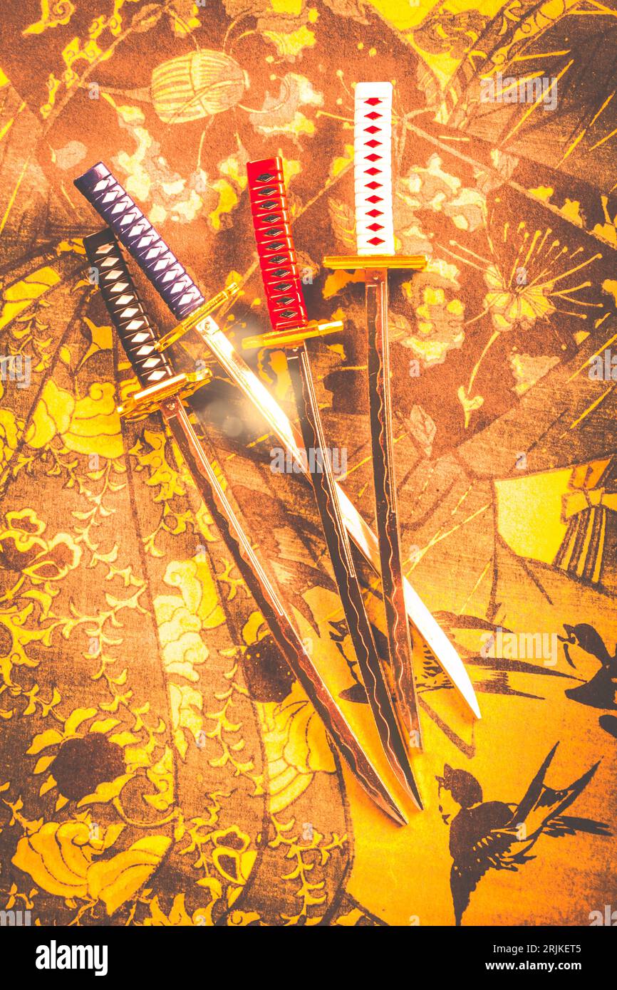 Still life art on a collection of samurai swords gaming dominance in flares of legendary battle Stock Photo