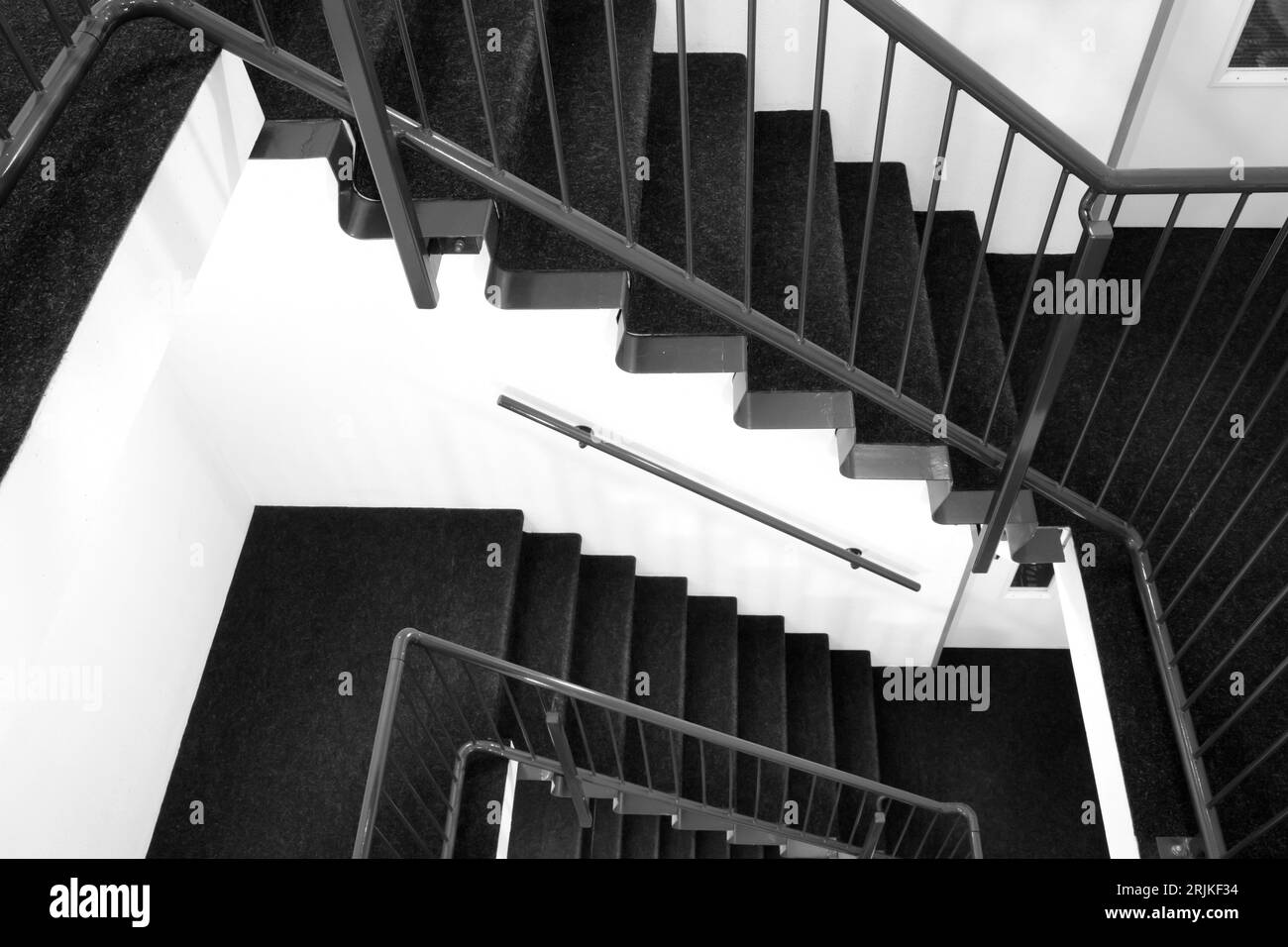 Modern emergency escape staircase stairwell made of metal Stock Photo