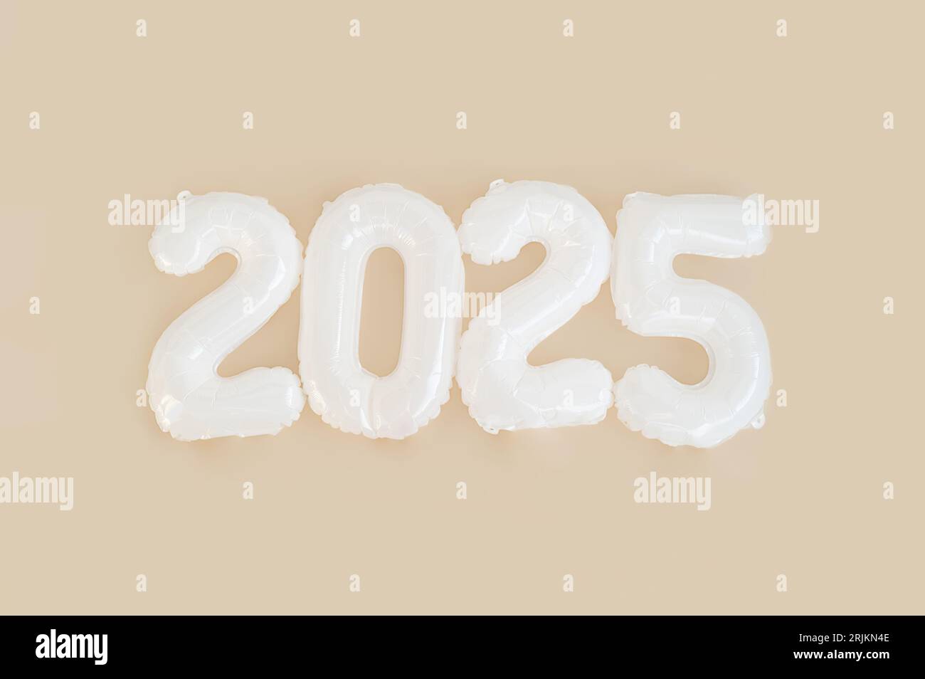 2025 numbers from white balloons. New Year neutral colours arrangement. Stock Photo