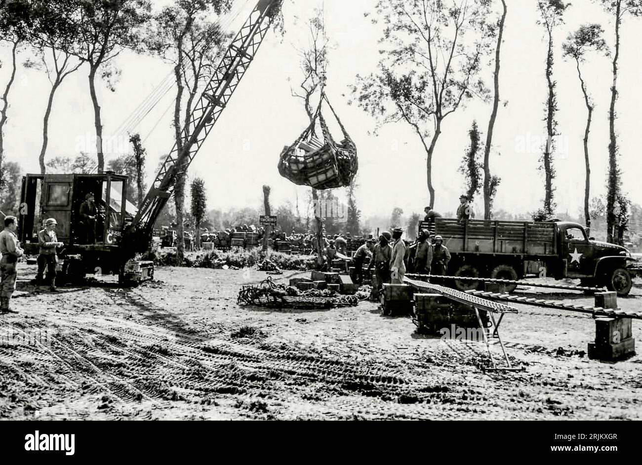 World War II FRANCE. Invasion of Normandy 1944, US Army Ordnance Unit Loads Ammo into 2 1/2