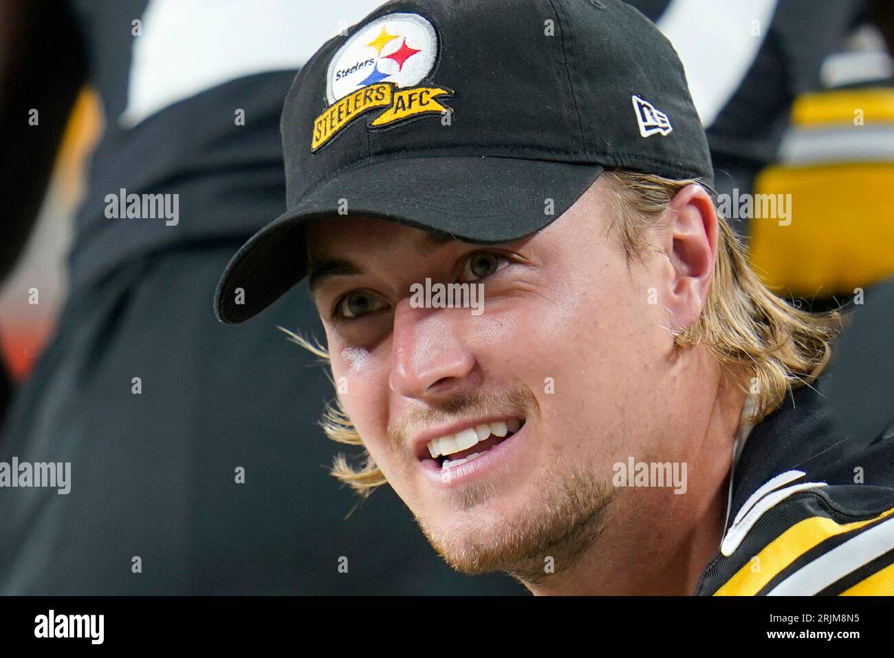 Pittsburgh Steelers quarterback Kenny Pickett sits on the bench during