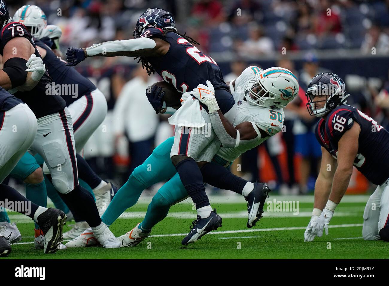 Houston Texans running back Mike Boone (22) warms up during pregame of an  NFL pre-season football game against the New England Patriots, Thursday,  Aug. 10, 2023, in Foxborough, Mass. (AP Photo/Greg M.