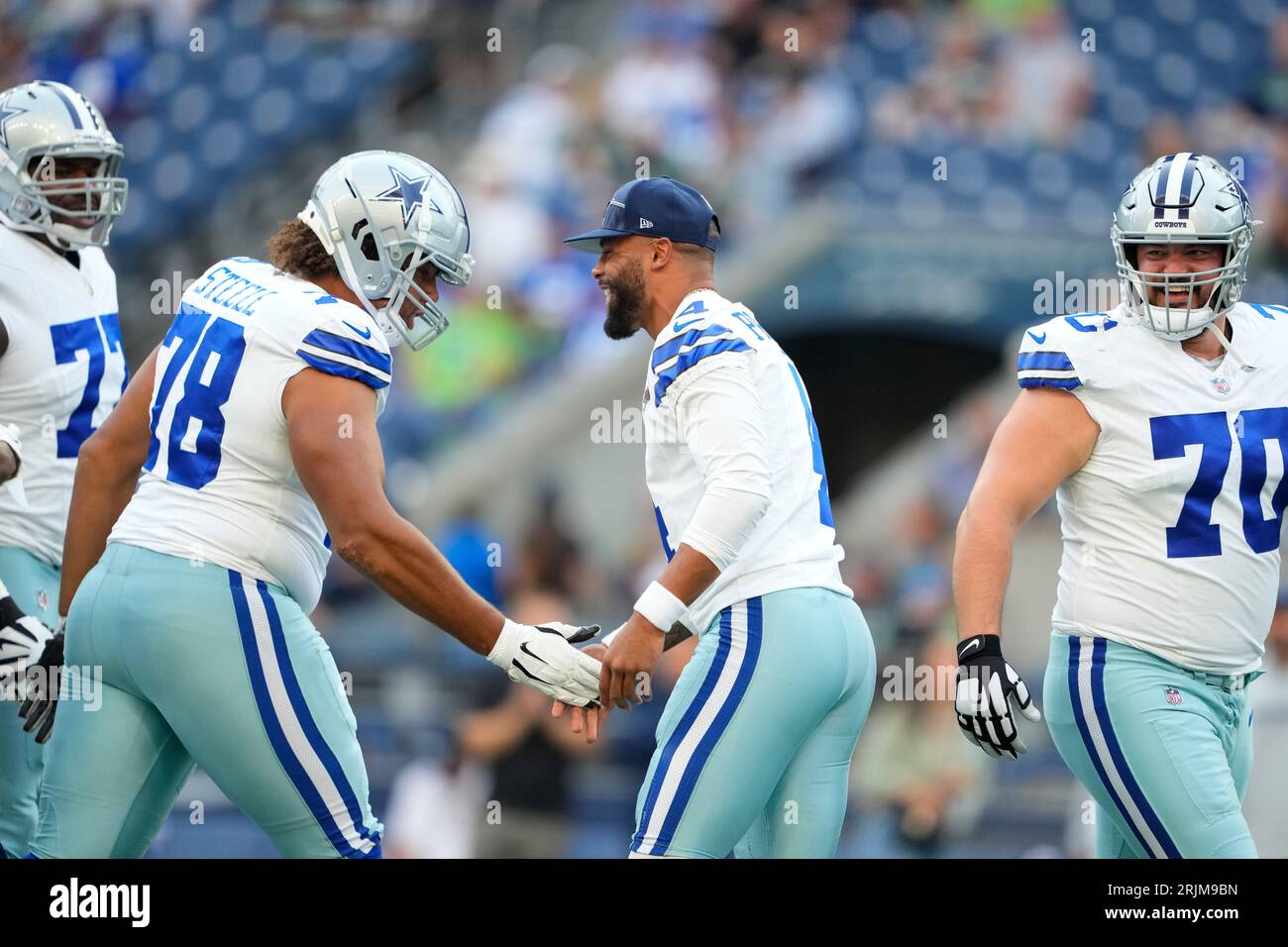 Dallas Cowboys offensive tackle Terence Steele (78) quarterback Dak  Prescott (4) as guard Zack Martin (70) looks on before a preseason NFL  football game against the Seattle Seahawks, Saturday, Aug. 19, 2023,