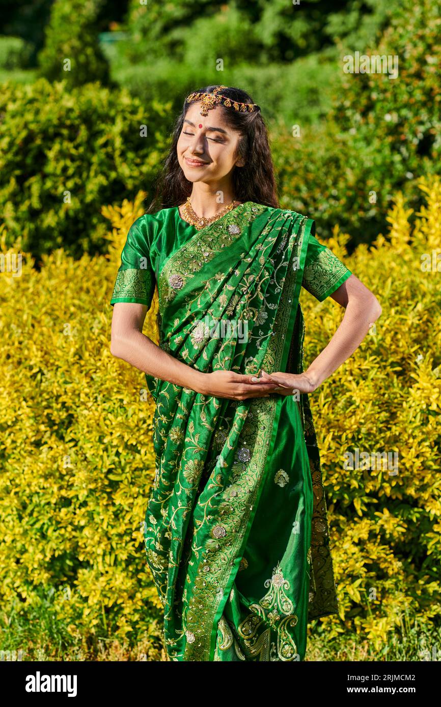 Smiling indian woman posing hi-res stock photography and images - Alamy