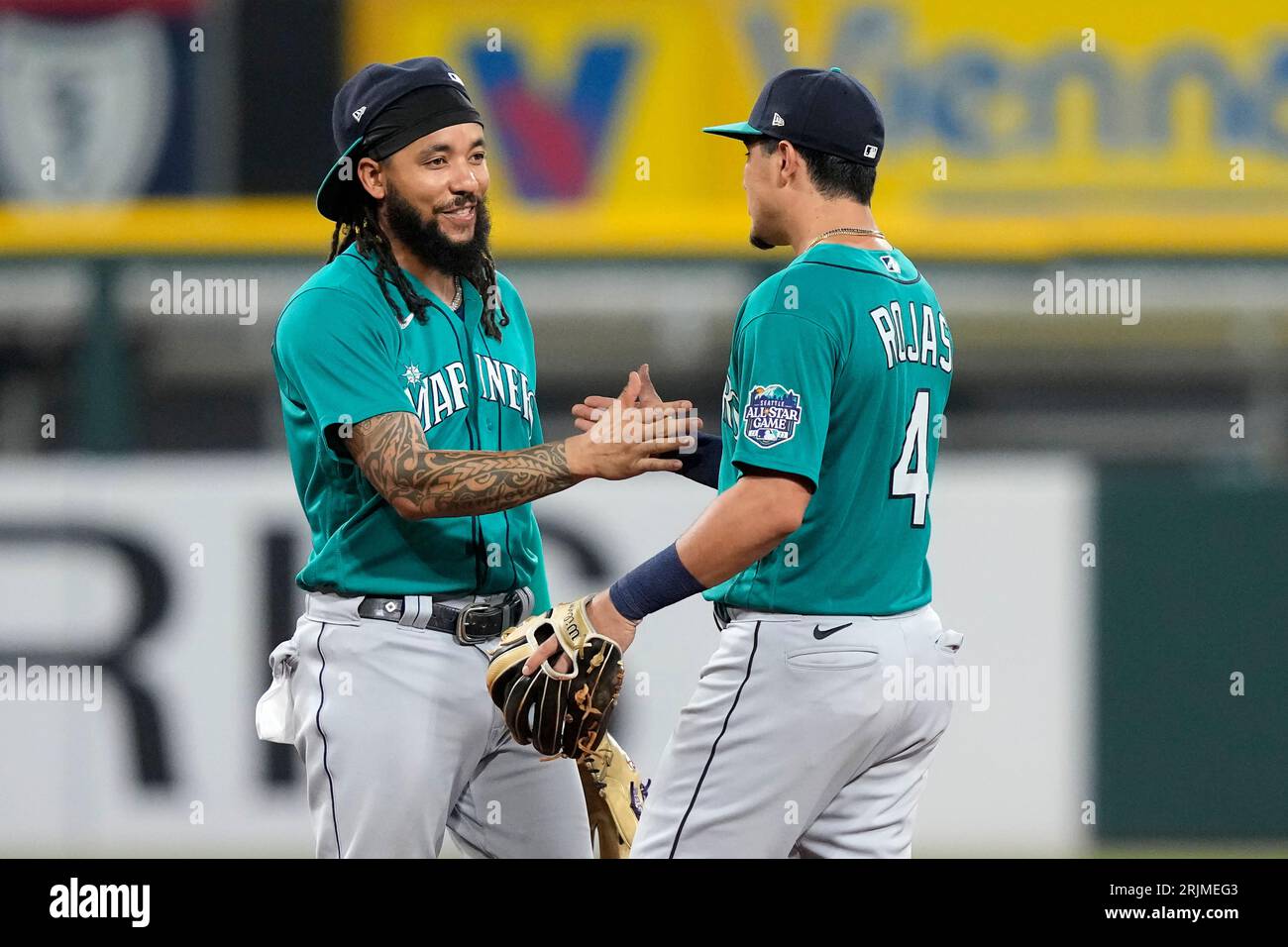 Seattle Mariners shortstop J.P. Crawford, left, and second baseman Josh ...