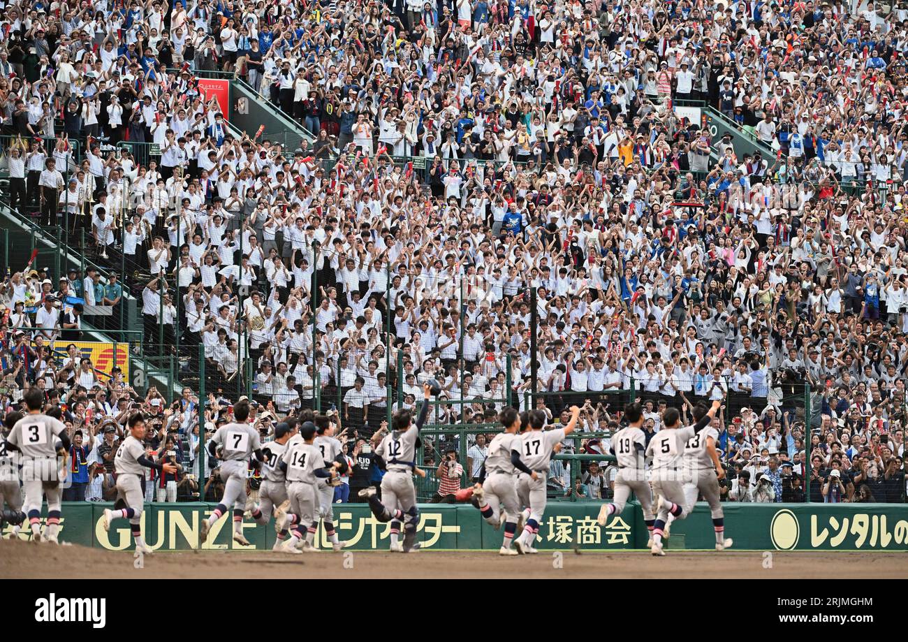 Keio High Members of Keio Senior High School Baseball Club react after winning ...