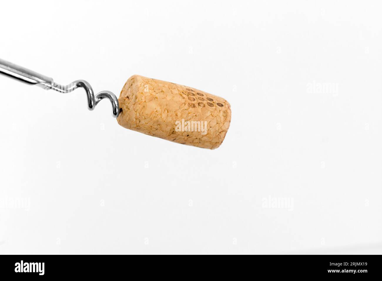 Close-up wine cork on corkscrew. Bottle opener. Stock Photo