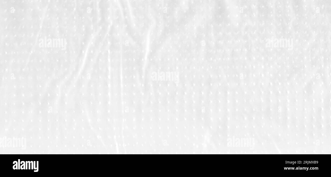 White texture of a plastic cellophane film that can be used as