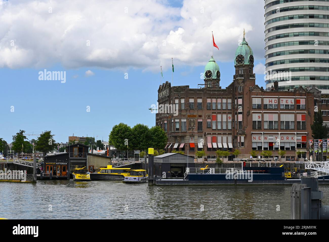Hotel NewYork at the Koninginnenhoofd on the Kop van Zuid in Rotterdam. A jetty location for water taxis in front Stock Photo