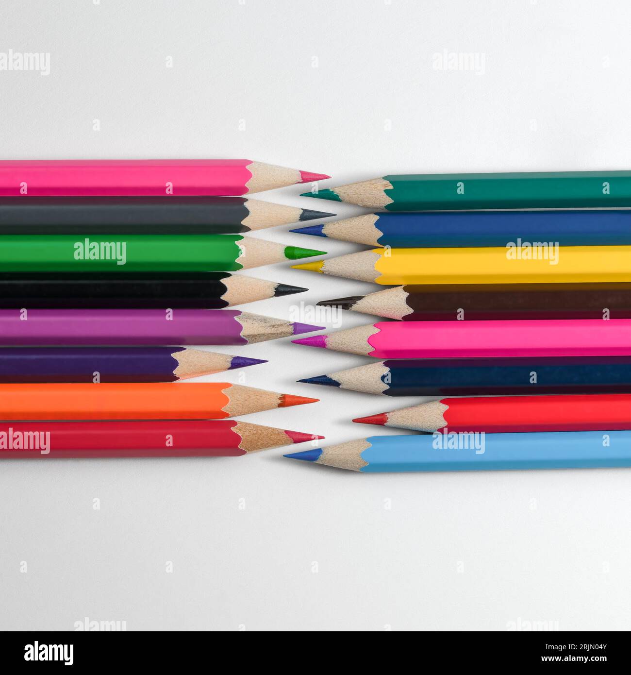 Sketchbook and crayons on a white table. White table and white background  Stock Photo - Alamy