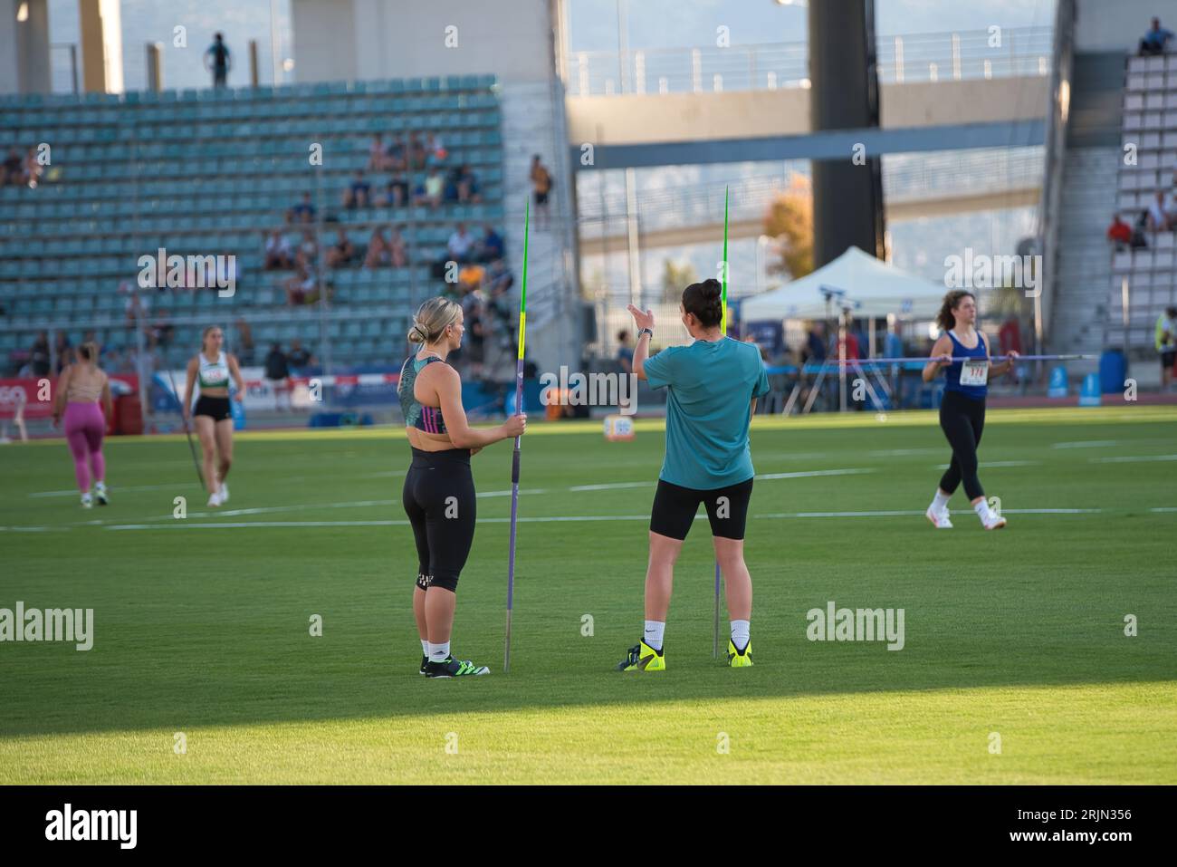 Greek javelin champions warm up before the race, Elina Tzengko