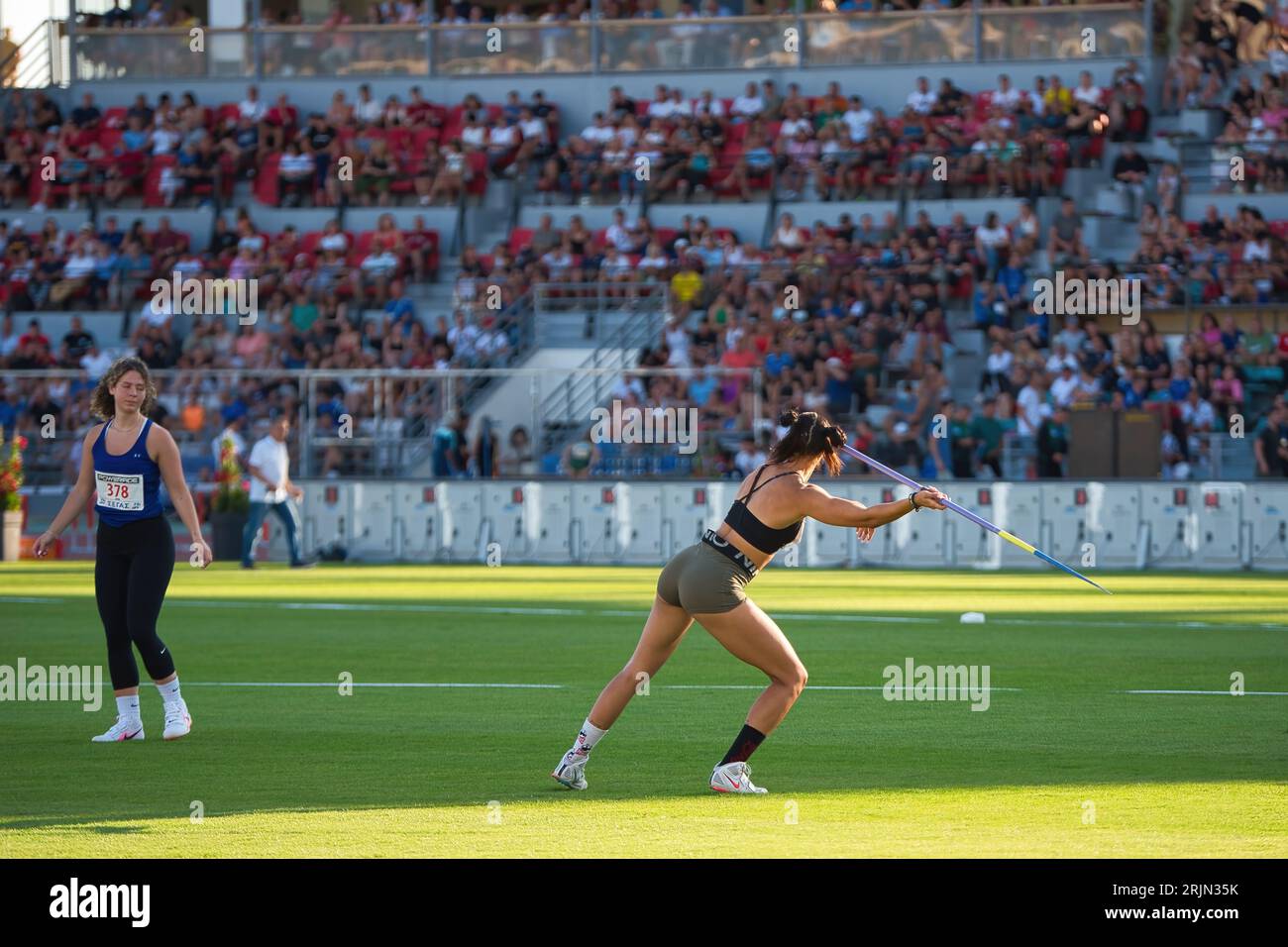 Greek javelin champions warm up before the race, Elina Tzengko