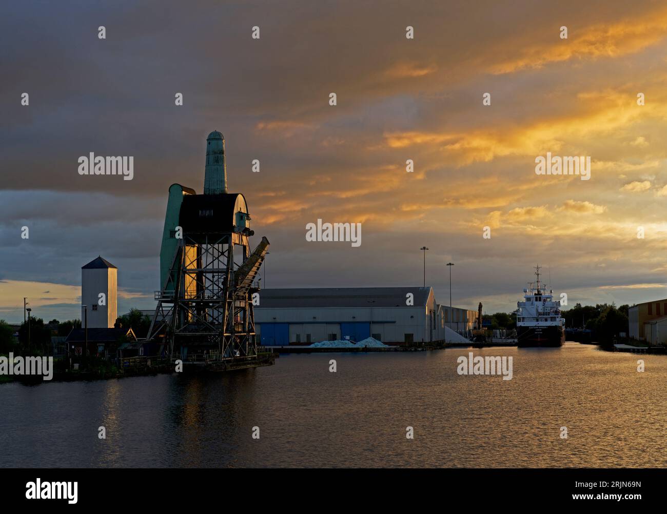 The Tom Pudding hoist, at sunset, at the docks, Goole,. East Yorkshire, England UK Stock Photo