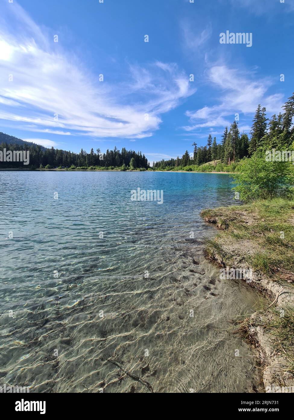 Lush green landscape calm waters hi-res stock photography and images ...