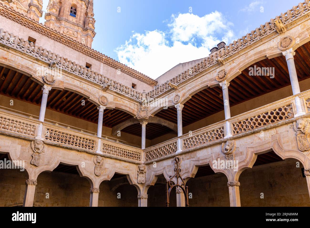 Casa de las Conchas in Salamanca, Spain, inside courtyard view with Gothic and renaissance elements, carved arches and cloisters. Stock Photo