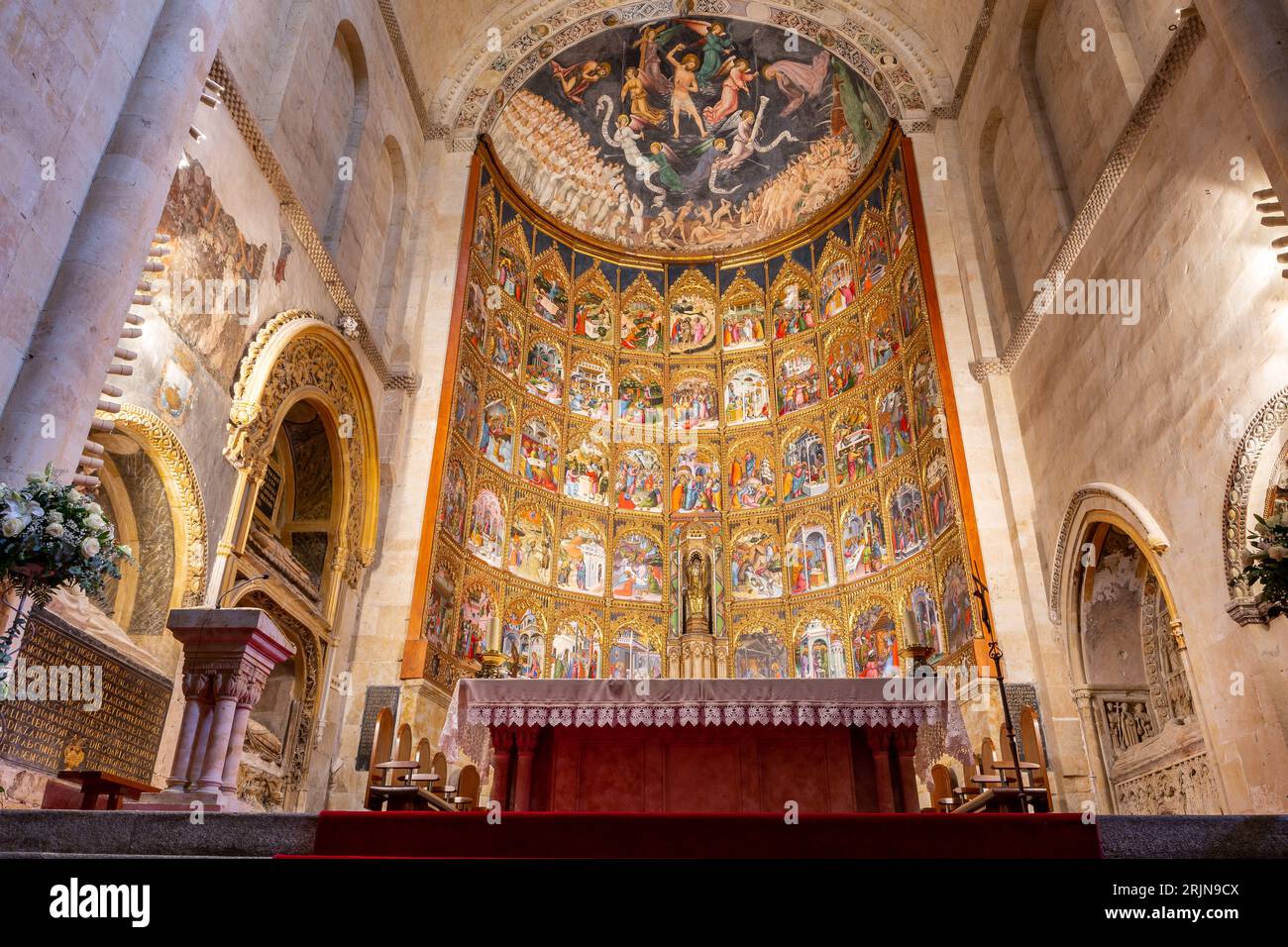 Salamanca, Spain, 06.10.21. The main altarpiece of the Old Cathedral (Catedral Vieja) in Salamanca with tables and icons showing life of Jesus, richly Stock Photo