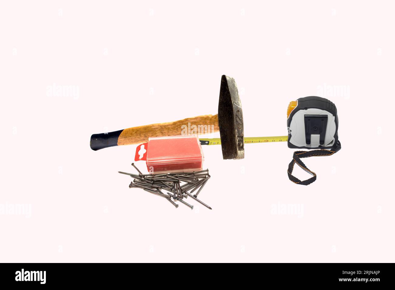 A hammer with other tools on a white background Stock Photo - Alamy