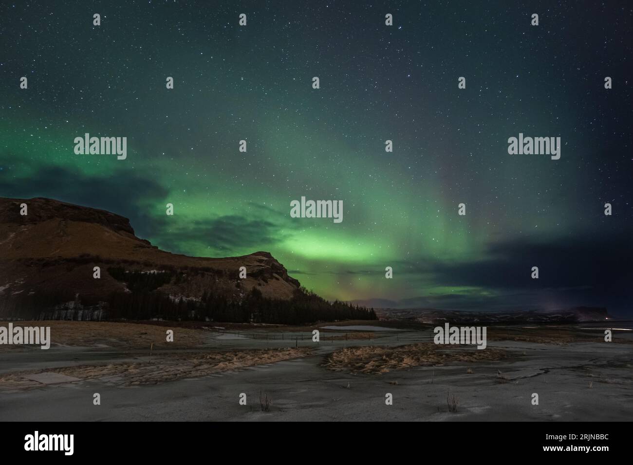 A breathtaking view of the aurora borealis in the night sky above ...