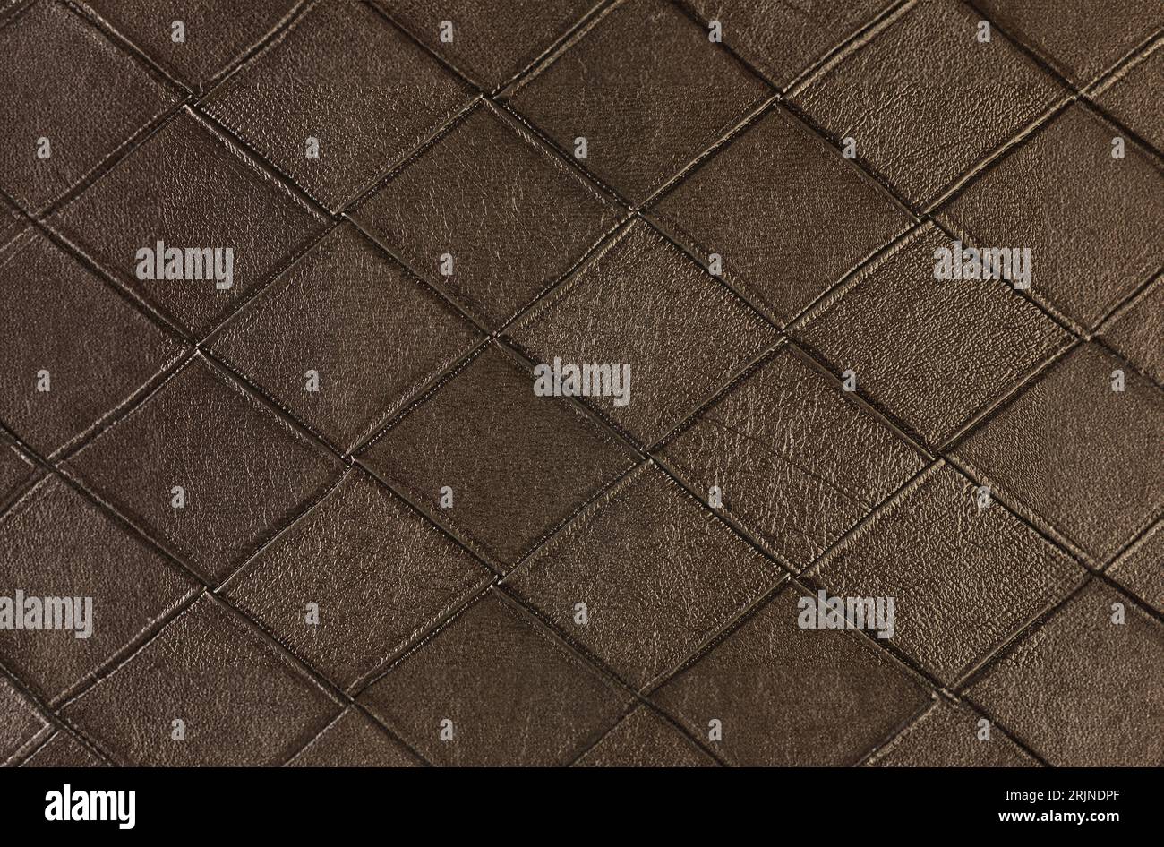 Artificial textured leather background synthetics closeup Stock Photo