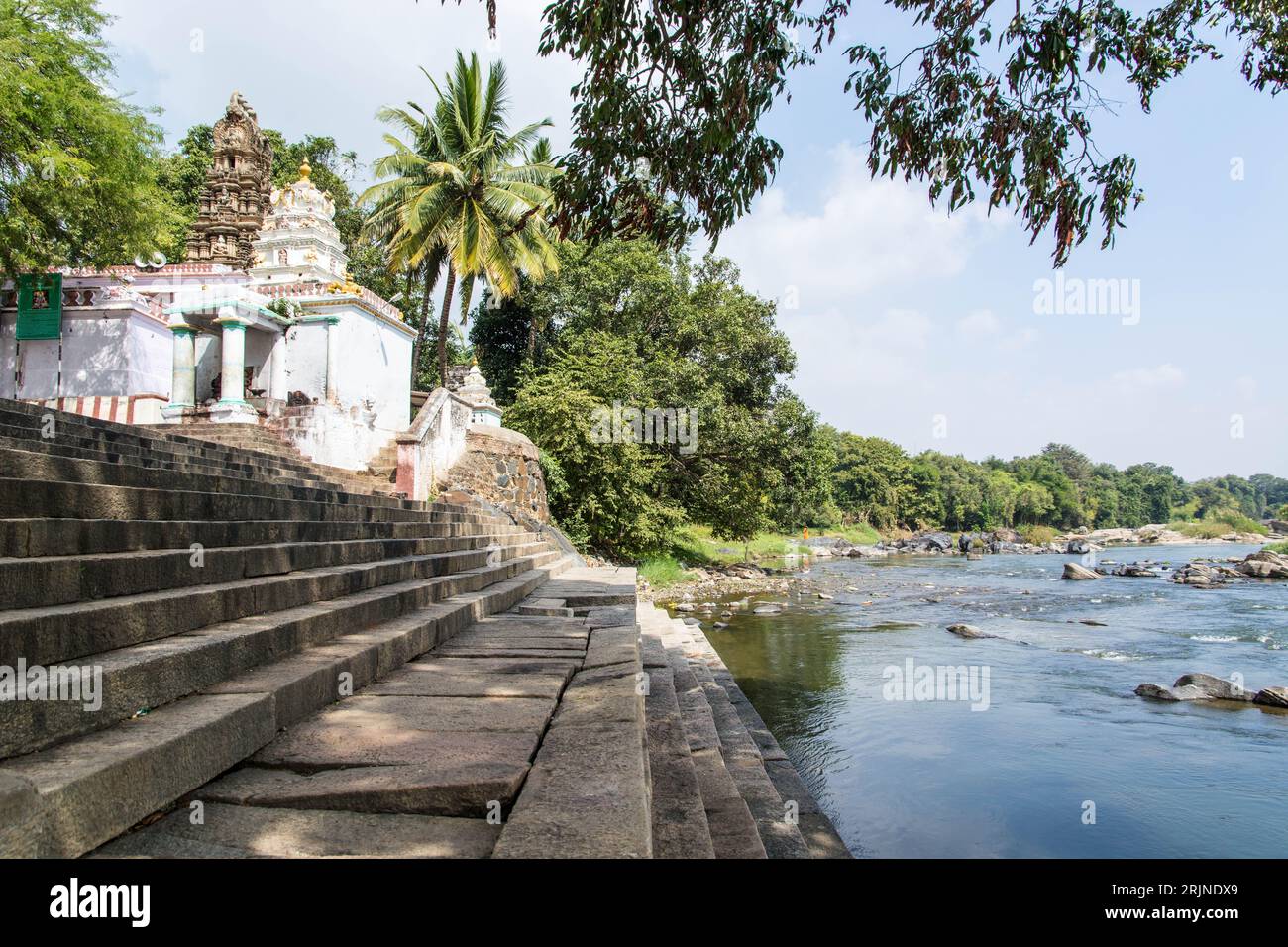 A low-angle shot of Stone steps at the holy site of Srirangapattana Ghat at the Kaveri River side at Srirangapatna, India Stock Photo