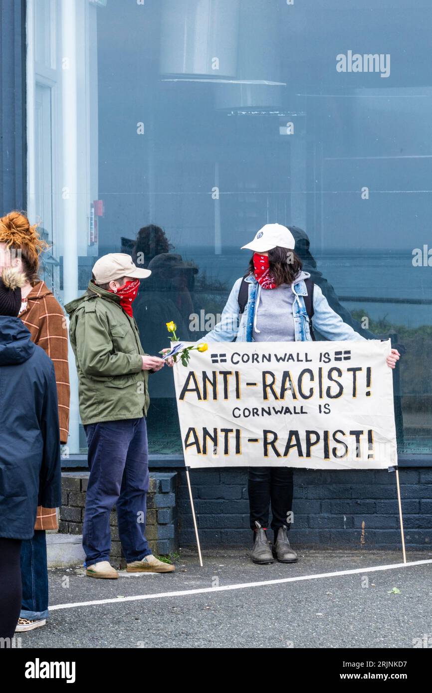Protesters gathering outside the Beresford hotel in support of asylum seekers in Newquay in Cornwall in the UK. Stock Photo