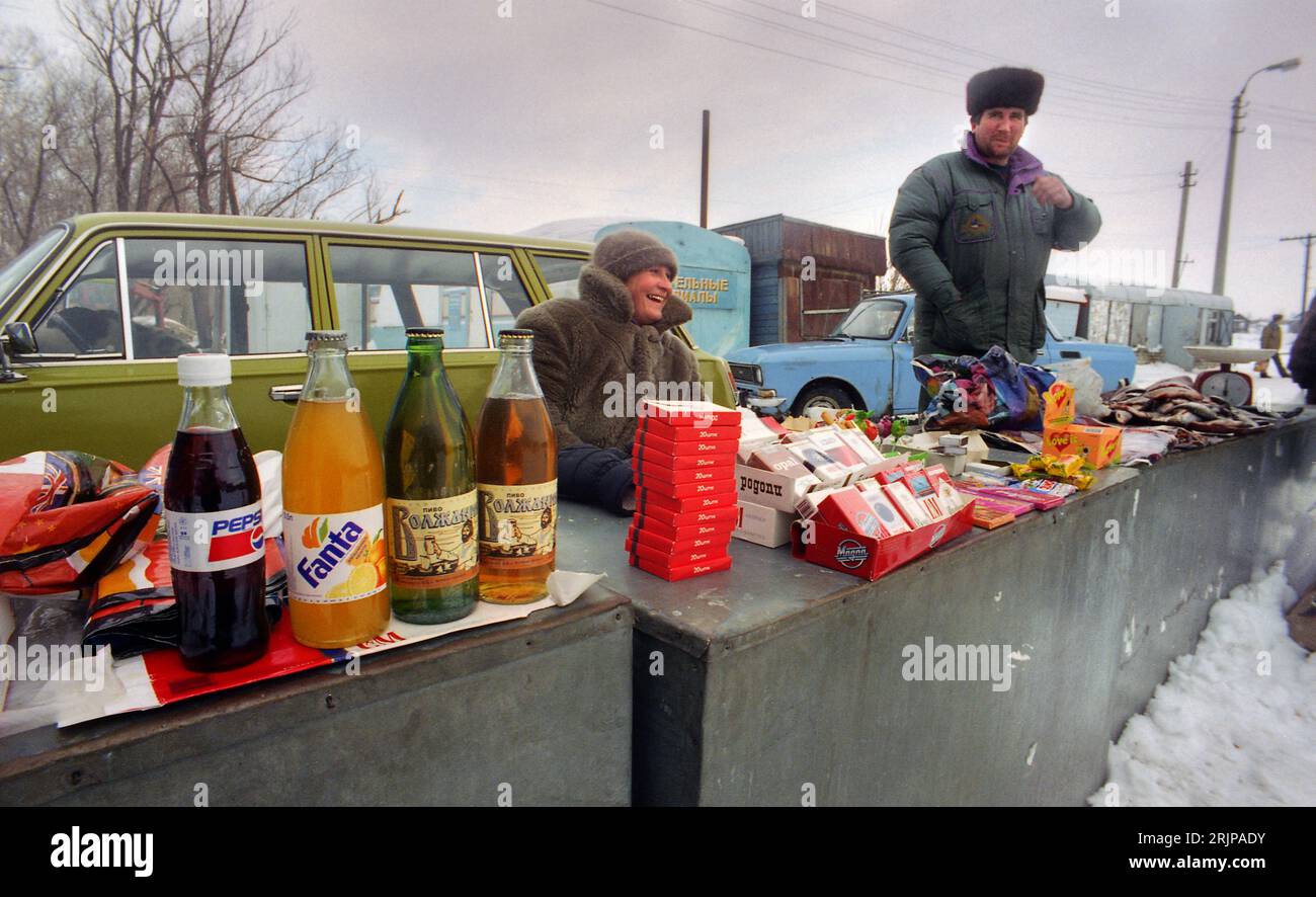 Volgograd, Russia - January 1996: Scanned film image of Russian outdoor convenience store in winter on the banks of the Volga River. Editorial. Stock Photo